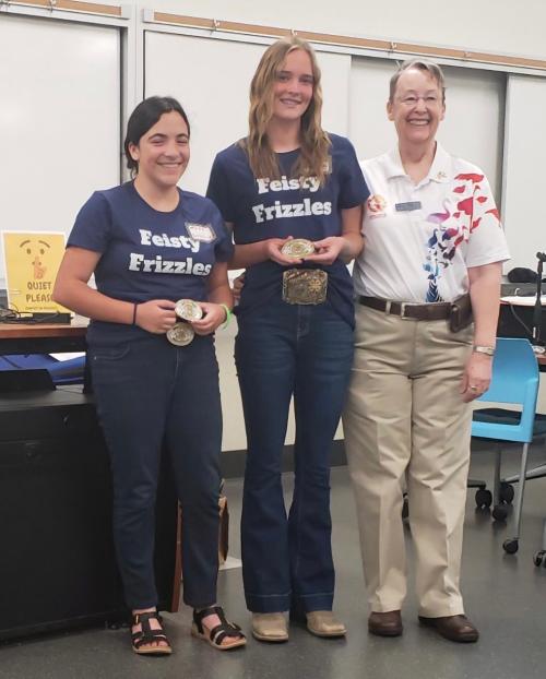 Tess Morici and Kakence Erickson, California Sr. Avian Bowl Champions, with Dr. Bradley